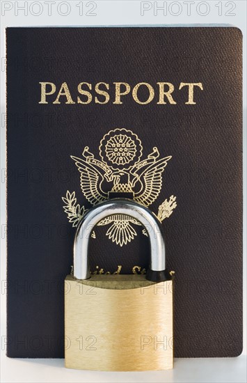 Close up of lock and passport. Date : 2008