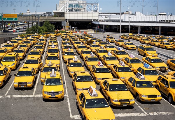 Rows of taxis waiting at airport. Date : 2008