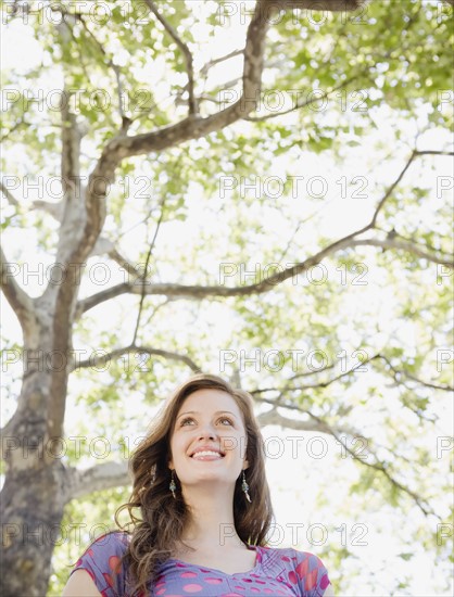 Low angle view of woman in park. Date : 2008