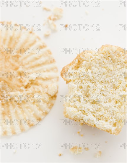 Close up of half eaten muffin and wrapper. Date : 2008