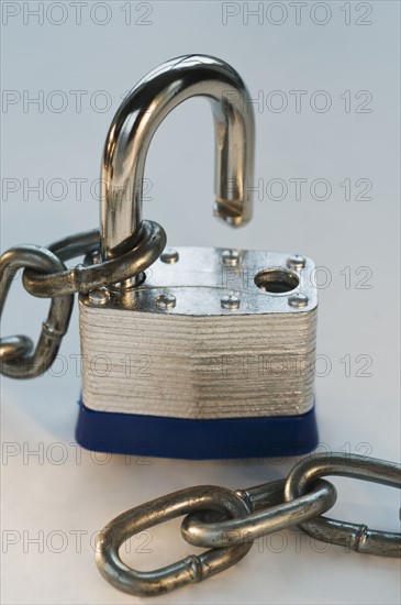 Close up of lock and metal chain. Date : 2008