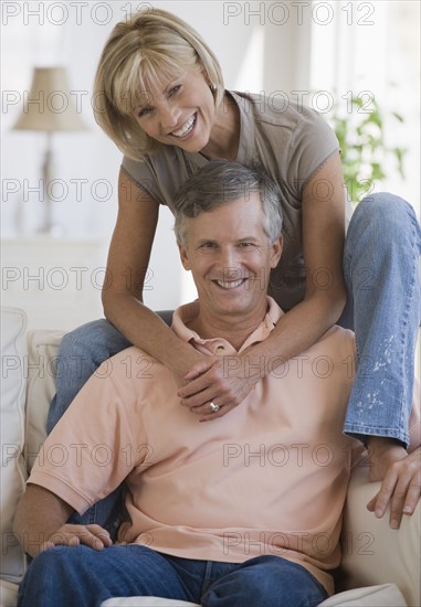 Couple relaxing in livingroom.