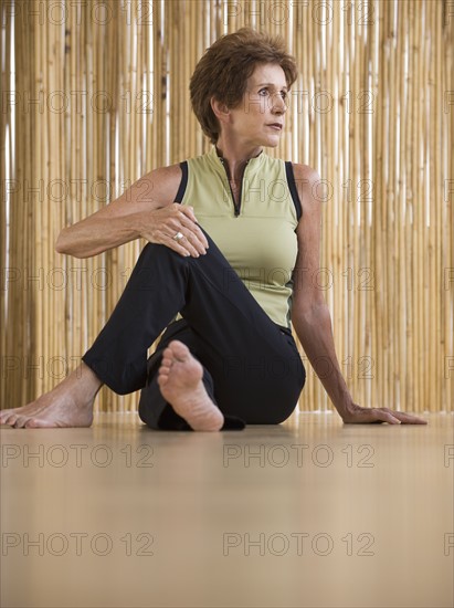 Senior woman doing yoga.