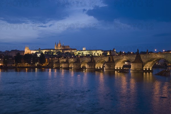 Bridge and river at night.