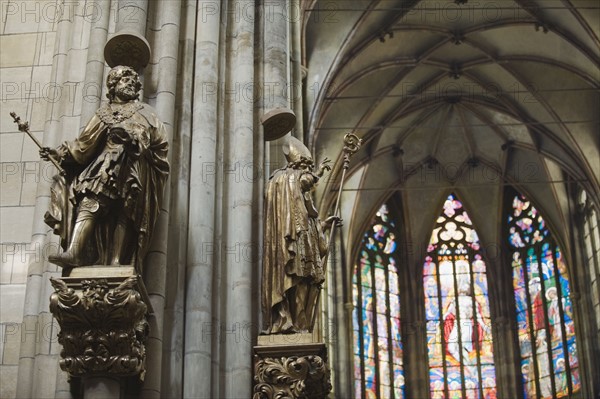 Statues and church interior.