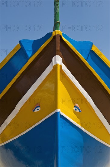 Close up of colorful boat prow.
