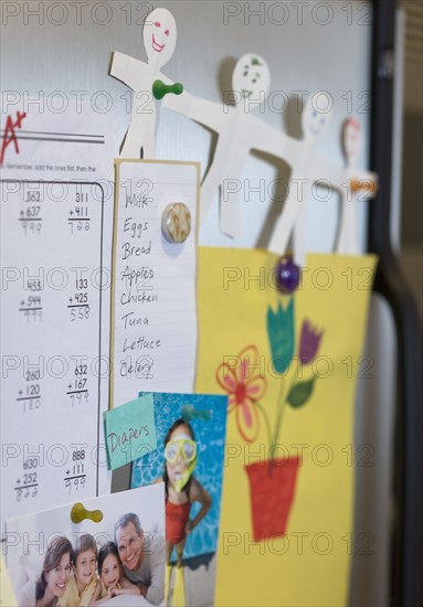 Assorted decorations on refrigerator.