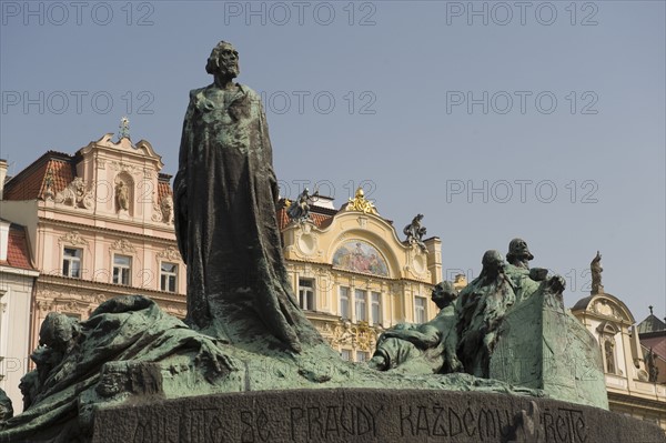 Historical monument in plaza.