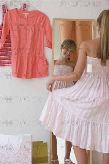 Girl shopping for new clothes.