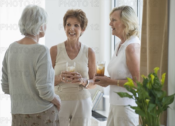 Senior women socializing.