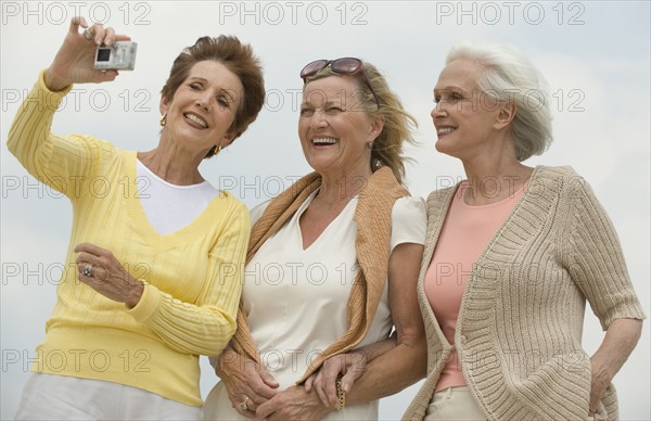 Senior women taking portrait.