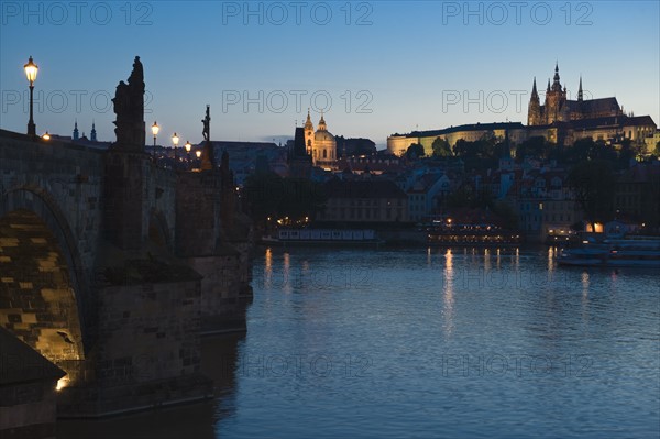 River and city at night.