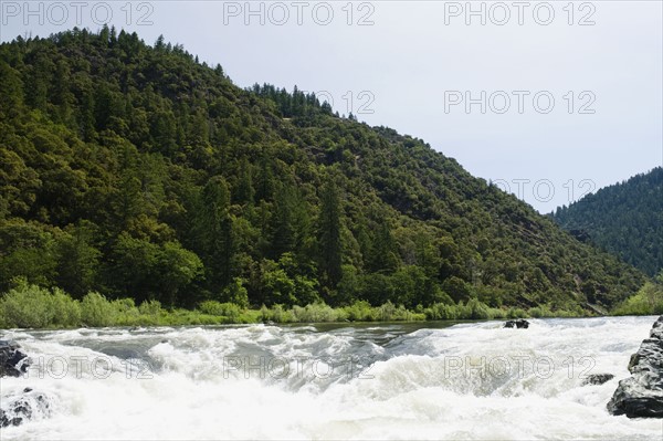 Whitewater raft approaching waterfall. Date : 2008