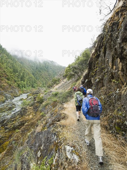 Group of hikers hiking on trail. Date : 2008