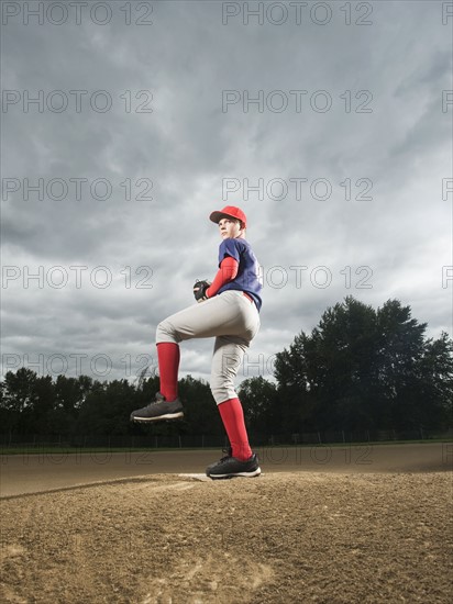 Baseball pitcher getting ready to throw ball. Date : 2008