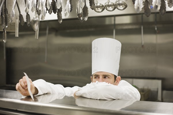 Frustrated chef reading ticket. Date : 2008