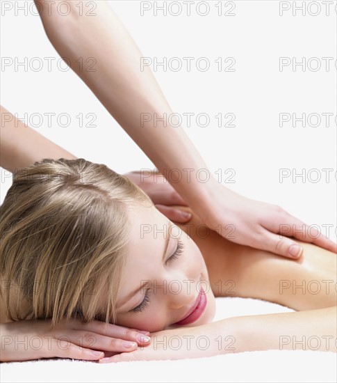 Young woman getting massage. Date : 2008