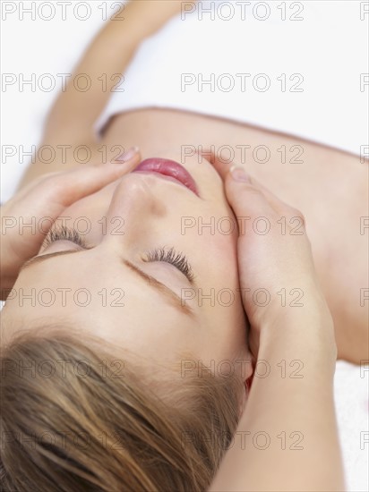 Young woman getting massage. Date : 2008