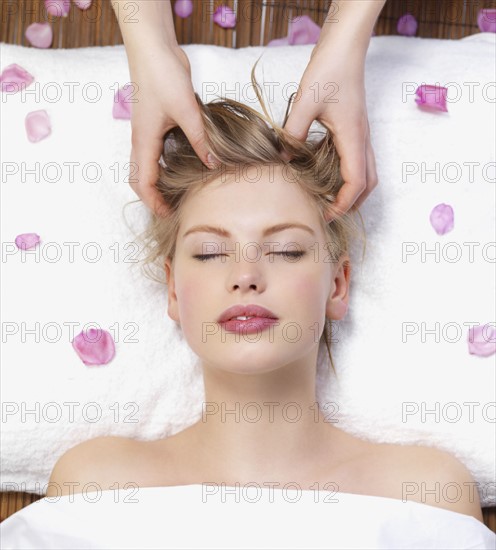 Young woman getting massage. Date : 2008