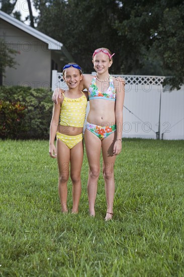 Girls posing on lawn. Date : 2008