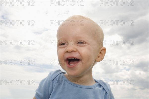 Close up of baby boy laughing. Date : 2008