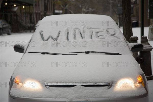 Parked car covered in snow. Date : 2008