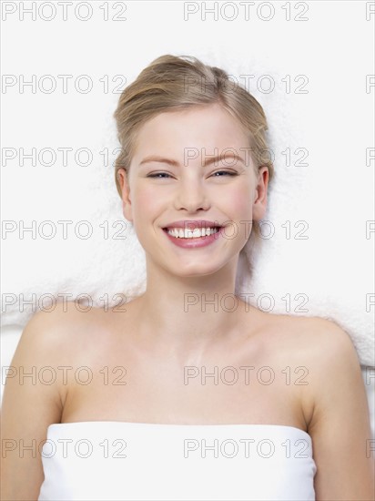 Young woman lying down in massage table. Date : 2008