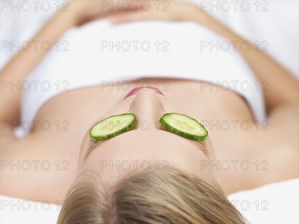 Young woman lying down in massage table. Date : 2008