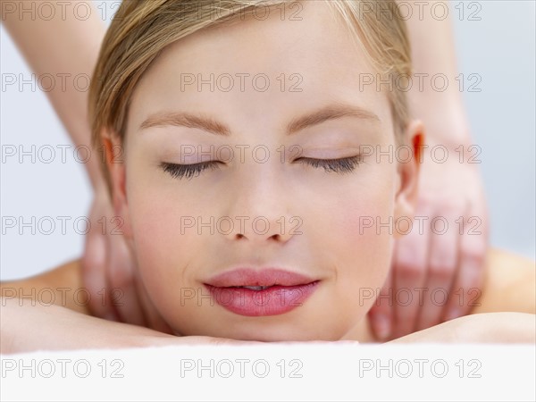 Young woman getting massage. Date : 2008