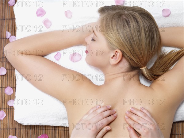 Young woman getting massage. Date : 2008