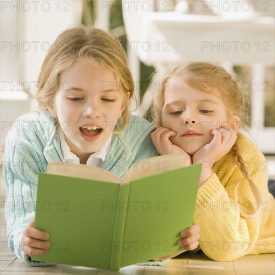 Sisters reading on porch. Date : 2008
