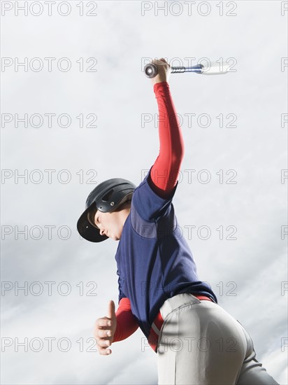 Baseball player swinging bat. Date : 2008