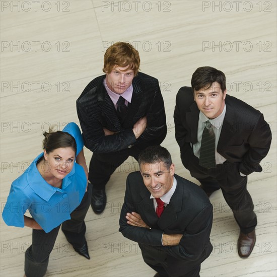 High angle view of businesswoman and businessmen. Date : 2008