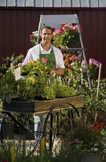 Man working in garden center. Date : 2008