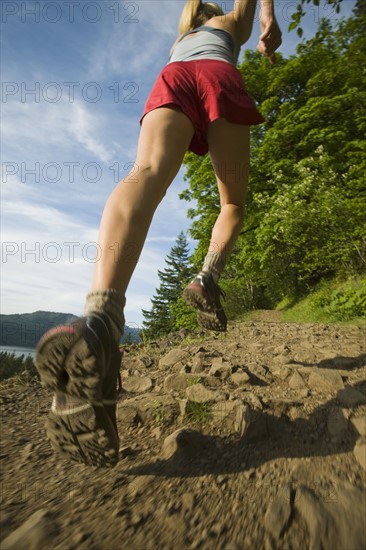 Runner on rocky trail. Date : 2008