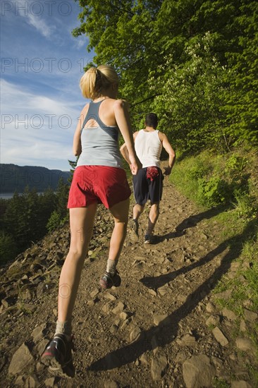 Runners ascending rocky trail. Date : 2008