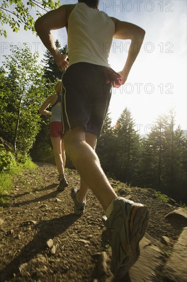 Runners ascending rocky trail. Date : 2008