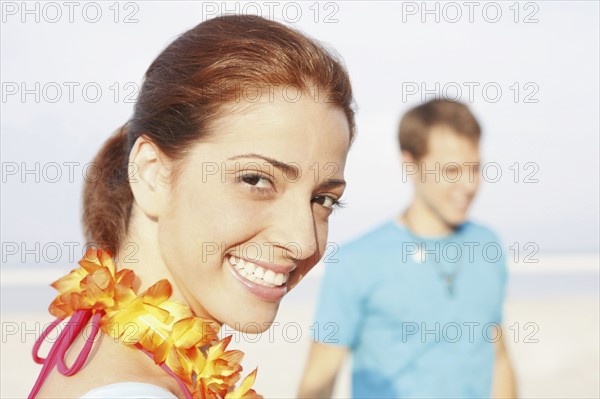 Young woman smiling on beach. Date : 2008