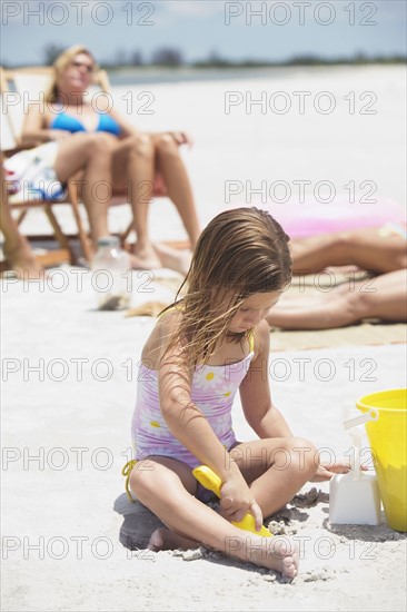 Family vacationing at beach. Date : 2008