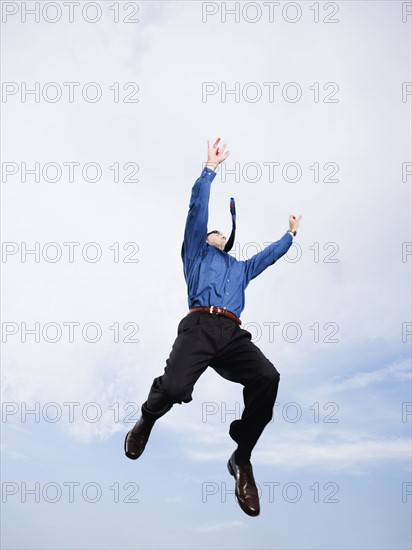 Businessman in mid-air. Date : 2008