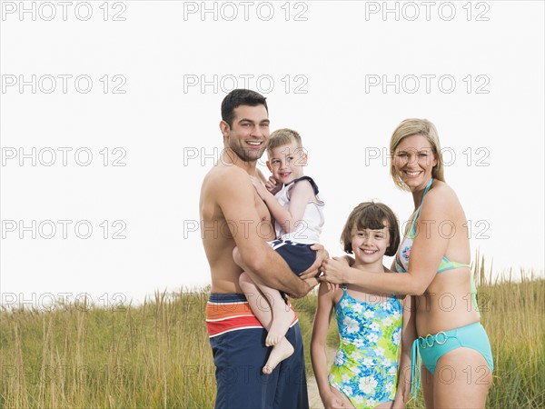 Portrait of family in bathing suits. Date : 2008