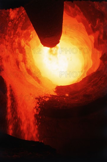 Concrete pouring into kiln. Date : 2008