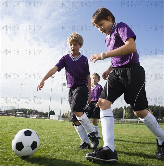 Boys playing competitive soccer. Date: 2008