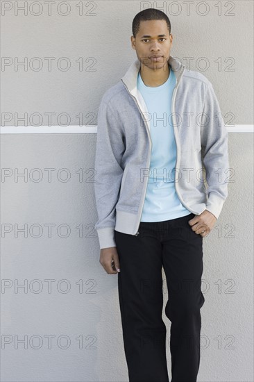Portrait of young man leaning against wall. Date : 2008