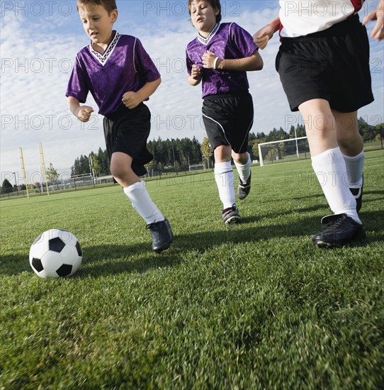 Boys playing competitive soccer. Date : 2008