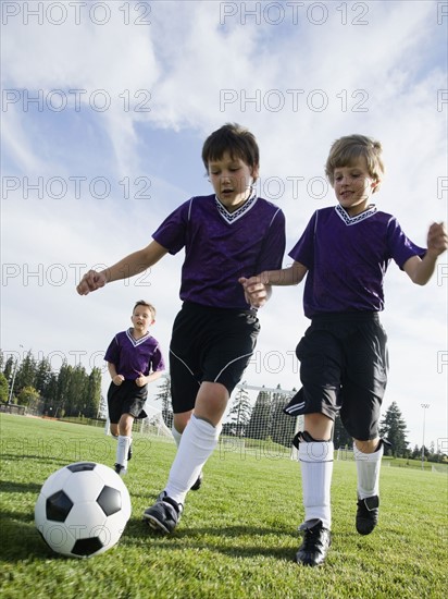 Boys playing competitive soccer. Date: 2008