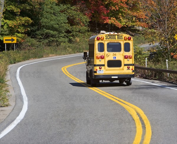 School bus driving down rural road. Date: 2008