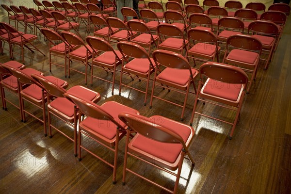 Fold up chairs in rows. Date : 2008