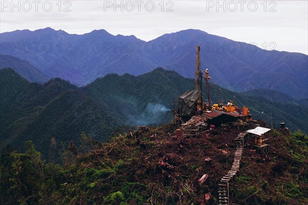 Oil drilling platform in Jayawijaya Mountains, Indonesia. Date: 2008