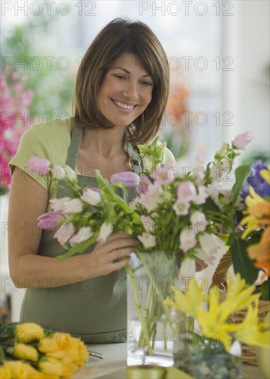Florist arranging flowers.
